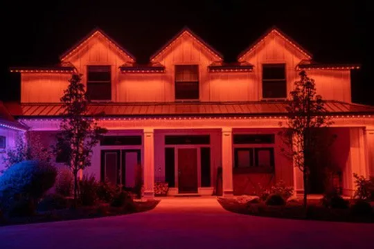 Red lighting by Bosso on house roofline