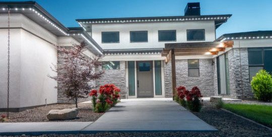 Modern home with clean Bosso roofline lighting