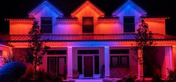 Modern farmhouse lit in red